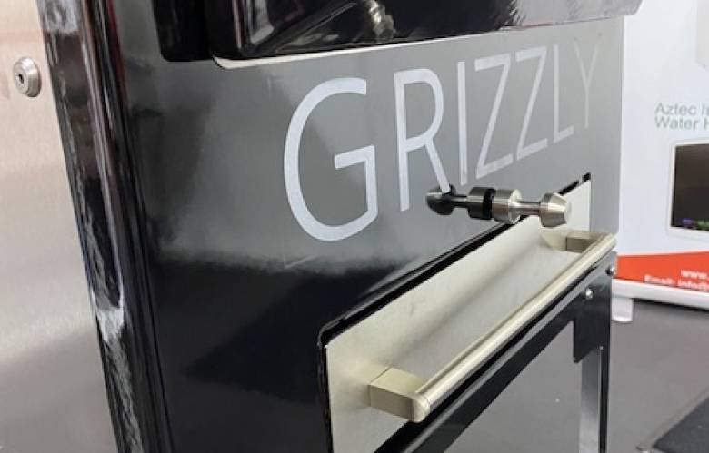 Grizzly logo on black oven